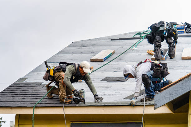 Professional Gutter Installation technician working in Howells, NY